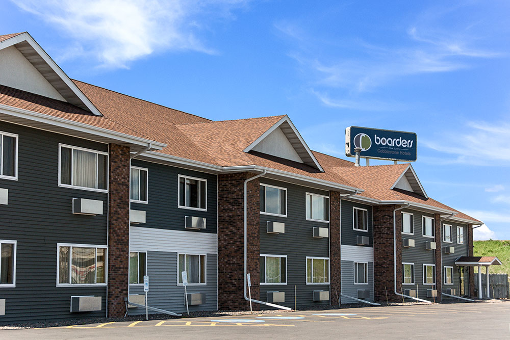 exterior of a boarders inn and suites