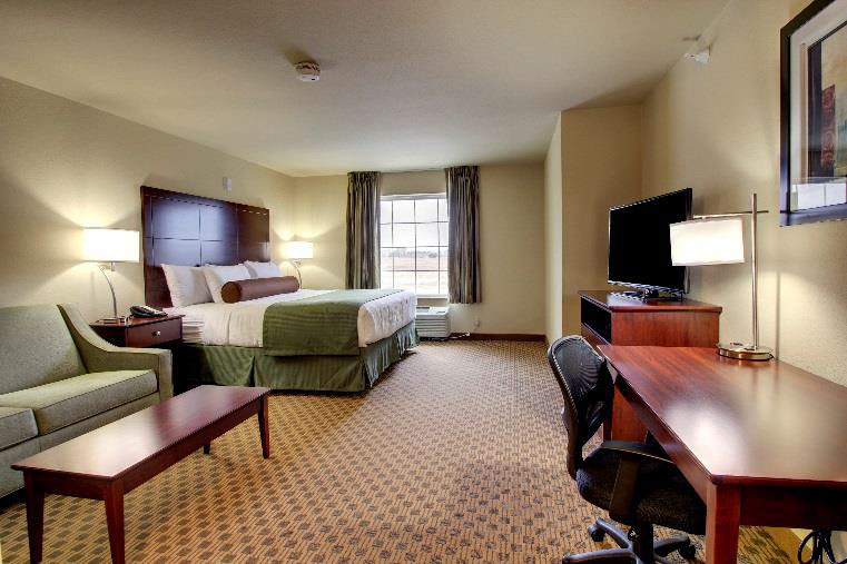 guest room in cobblestone inn and suites 