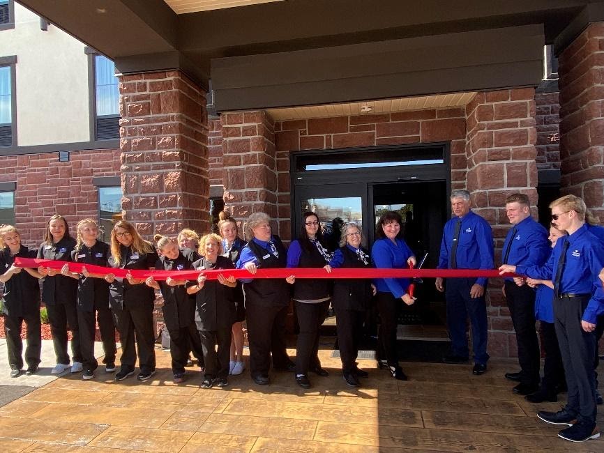 Team Little Chute celebrating the grand opening and ribbon cutting.